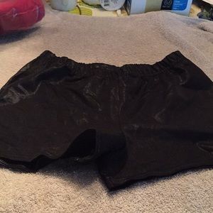 Black shiny short shorts